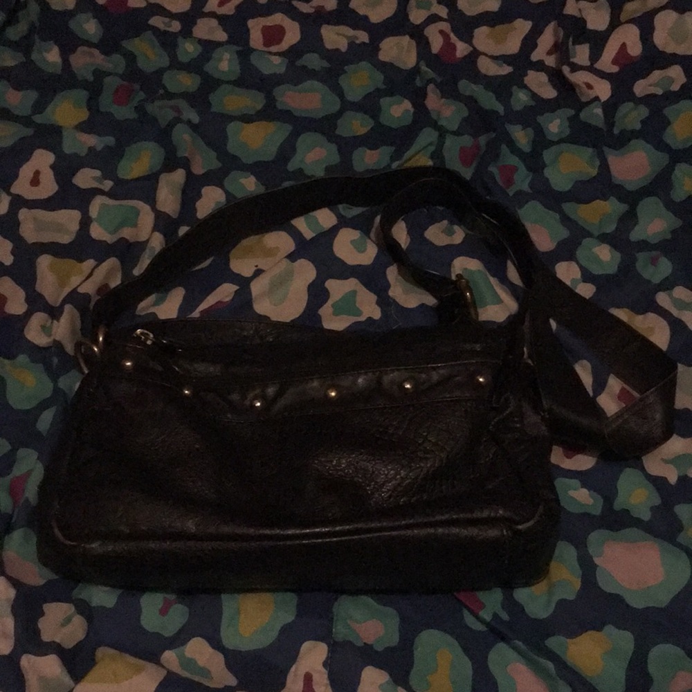 Never used black purse is an old bought purse